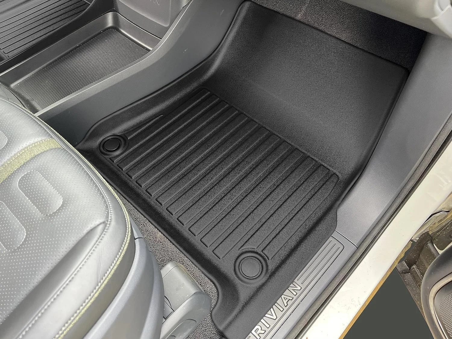 Laser measured custom fit for Rivian R1S floor mats