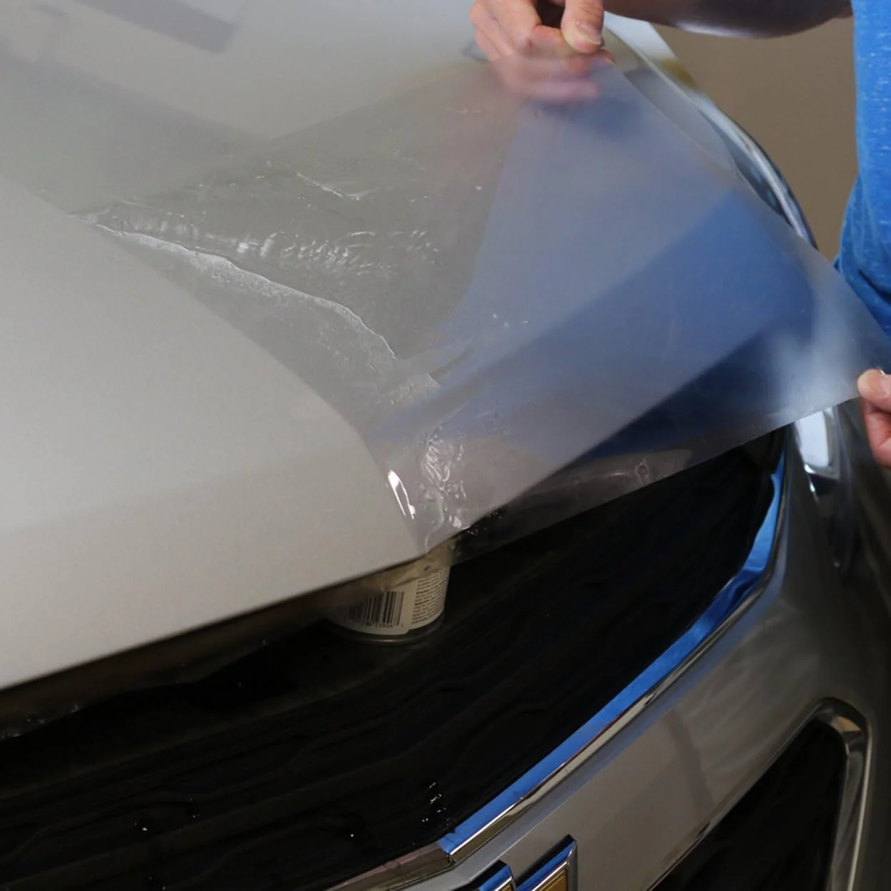 Precisely cut paint protection film pieces for an electric car